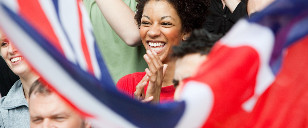 fan experience fan in crowd cheering for team